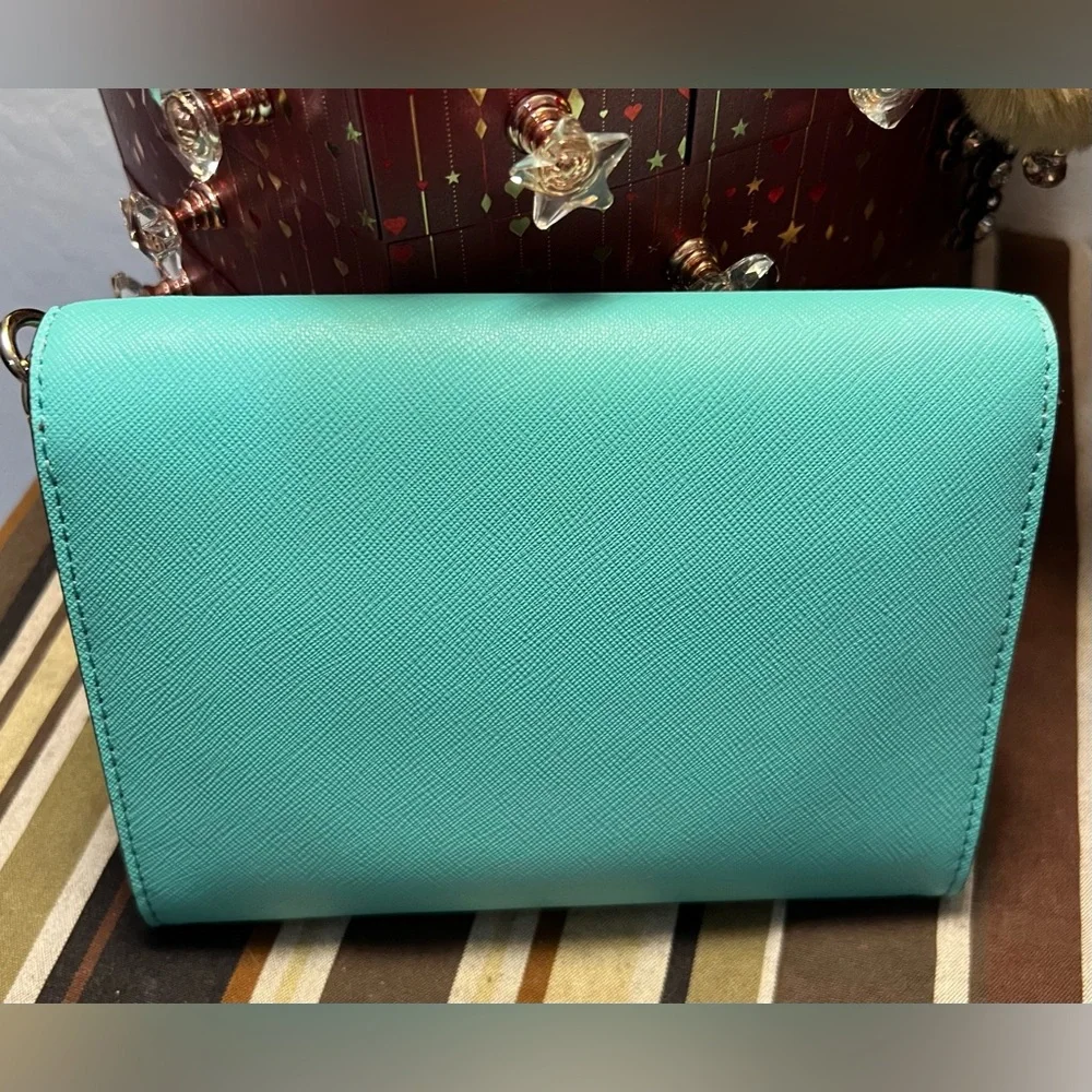 Kate Spade Turquoise/light blue Monday “Share your last piece of gum” Crossbody